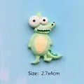 Close-up of a 2.7x4cm green resin cartoon crocodile charm for DIY crafts and magnets - Mr. Crocodile