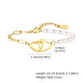 Detail of 16-19.5cm pearl and gold chain bracelet with interlocked heart charms and OT toggle - BR-2126 (Pearl Splicing)