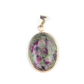 Oval gold-rimmed pendant featuring a red and green natural agate gemstone stone - Ruby Zoisite