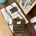Striped plush crossbody bag with colorful brand label and durable rope shoulder strap - Brown Stripe