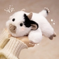 Plush black and white cow toy with soft fur and cute blushing face in a lying pose - Cow