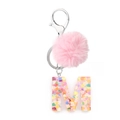 Resin letter M keychain with pink faux fur pompom and colorful heart sequins - Letter M