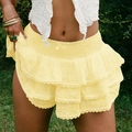 Jupe courte en dentelle jaune à volants avec taille élastique et petit nœud - S / Jaune