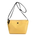 Minimalist bright yellow dumpling-style crossbody bag with sleek black cord strap - Yellow