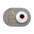Grey oval leather placemat with woven texture and gold cutlery set on white background - Oval / Oval Light Gray
