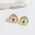 Gothic style evil eye stud earrings in gold with blue stones and white crystals - Crescent Moon