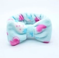 Light blue coral fleece headband with pink heart patterns and a bow tie design - Sky Blue Strawberry