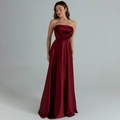 Detail of elegant burgundy satin evening dress showing draped pleats on the strapless bodice - Burgundy