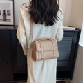 Minimalist beige PU leather crossbody square bag with top handle and double buckle straps - Khaki
