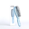 Transparent blue scalp massage brush with black bristles and white packaging box - Small / Blue