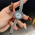 Elegant round shell dial watch for women with pearl and rhinestone bracelet silver finish - Silver