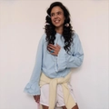 Light blue flare sleeve top with lace trim and white shorts styled for summer - S / Blue