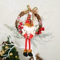 Christmas wreath with plush Santa Claus, red berries and pine needles on a natural vine ring - Small Branch Wreath Santa Claus