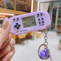 Mini handheld tetris game console keychain in purple with matching decorative ball - Long Handle Purple Mini Game Console