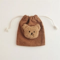 Close-up of brown corduroy drawstring pouch with a cute plush bear head decoration - Brown (Coffee Bear)