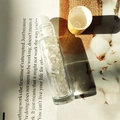 Clear glass essential oil roller bottle filled with natural white crystal and bamboo lid - White Crystal