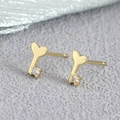 Elegant gold heart key stud earrings with a small cubic zirconia crystal detail - Heart Key