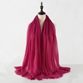 Solid rose red crinkle cotton linen scarf with soft fringe edges on a mannequin - Rose Pink Wrinkled