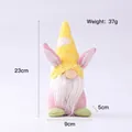 Yellow knitted Easter gnome plush with rabbit ears, size 23cm by 9cm and weight 37g - Yellow Hat