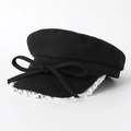 Classic black newsboy cap with elegant bow decoration and white lace trim detail - Black