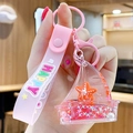 Pink sailboat liquid keychain with moving sequins and a pink silicone wrist strap - Ocean Creature - Starfish