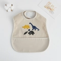 Waterproof baby bib with cute cartoon dinosaur patterns and a leak-proof bottom pocket - Pu Bib (double-layered Bib) - Three Dinosaurs / One Size