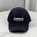 Close-up of distressed ripped details and white embroidered text on black cotton baseball cap - One Size (54-60cm) / Black