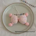 Pink lamb wool plush bow pendant with colorful specks and pom-poms, size 12x9cm - Pompom Bowknot / Pink Floral