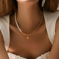 Detail of baroque pearl and gold plated paperclip chain necklace worn by model - Pearl Paperclip Splicing Ball Necklace (KN0104) / 18K Gold