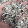 Polished phantom crystal quartz gravel in hand for energy healing and home decor - Phantom Quartz / 7-9mm 100g