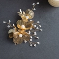 Golden bridal flower hair accessory with delicate metallic petals and white beaded details - Style 7 Long Hair Accessory Gold