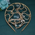 Detail of golden bridal headband with sparkling rhinestones and teardrop crystal pendants - A453 / Gold