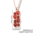 Rose gold necklace featuring red AAA cubic zirconia teardrop stones and round gems - Rose Gold - Red Stone