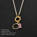 14K vergulde roestvrijstalen ketting met roze steen en een hartvormige hanger - Letter C / Goud