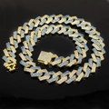 Detail of 15mm hip hop cuban chain featuring clear and blue rhinestones on gold links - Gold Plated Blue Zirconia