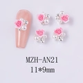Macro detail of 3D pink rose nail charms with pearls and silver beads, 11x9mm size - Silver Base Gradient Deep Pink Rose Style (AN21)