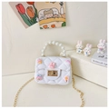 White children's crossbody bag with pearl handle, chain strap and cute cartoon charms - White
