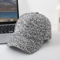 Fashionable leopard print baseball cap with wide brim on a lifestyle desk background - One Size / Light Gray