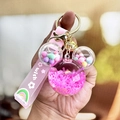 Pink cartoon mouse head keychain with colorful floating sand and silicone wrist strap - Rose Red
