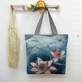 Canvas tote bag with lotus print and black and white striped straps in retro style - Lotus Pond Moonlight