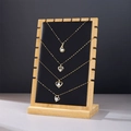 Bamboo necklace display stand with black velvet background for four pendant storage - Black Leather