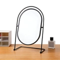 Oval desktop makeup mirror with minimalist black metal frame and swivel stand - Oval-Black