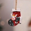 Close-up of a resin Christmas stocking and reindeer ornament with hanging twine rope - Style 6 (Deer in Christmas Sock)