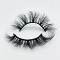Macro detail of 20mm thick mink faux eyelashes with dramatic curl on white background - B853-20F