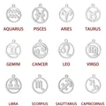 Set de 12 colgantes del zodiaco de acero inoxidable con signos plateados calados en rejilla - Estilo Hueco - Acuario / Color Acero