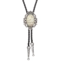Detailed view of crown bolo tie with white turquoise stone and silver tips - Howlite