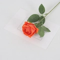 Lifelike orange velvet faux rose with green leaves on decorative card background - Small Velvet Orange Red