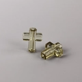 Macro shot of two transparent amber crystal cross beads for DIY jewelry making - Olive Green