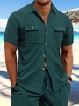 Detail of dark green waffle knit texture on men's shirt with flap pockets and buttons - Dark Green