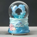 Rotating musical crystal ball with blue dolphin design and detailed ocean base - -030 Blue Pig / Large 100mm Inner Rotation + Snow